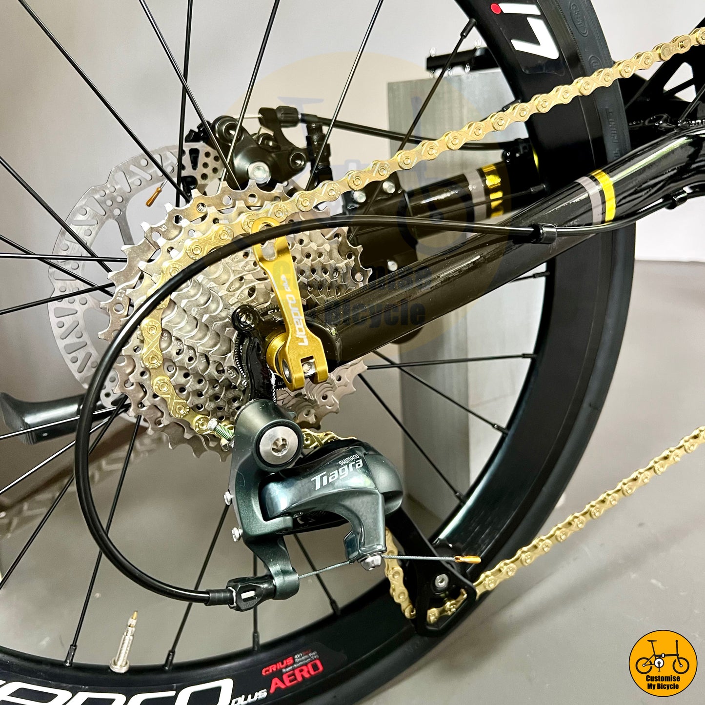 Black and gold folding bike with smooth Shimano 10 gears Tiagra shifting system