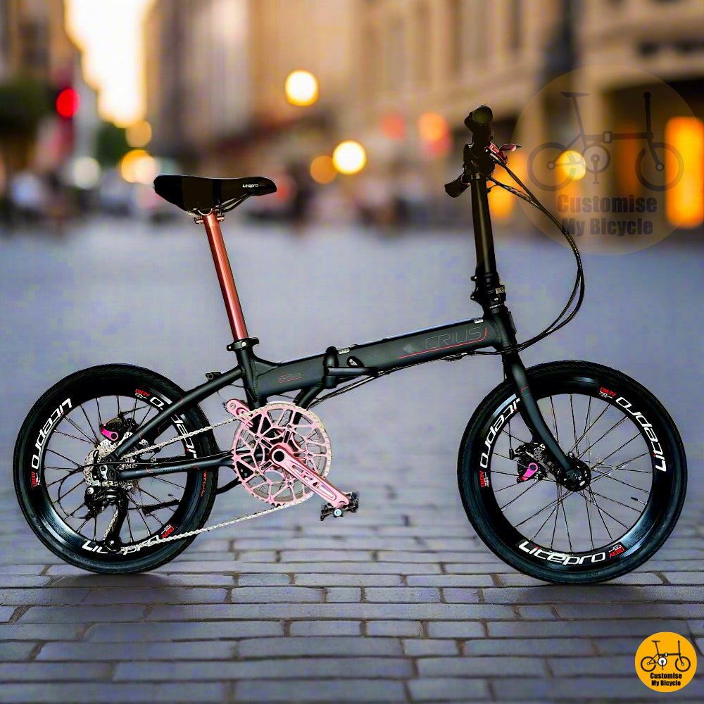 Crius Master folding bike with pink accent and 9-speed Shimano for smooth PCN cruising