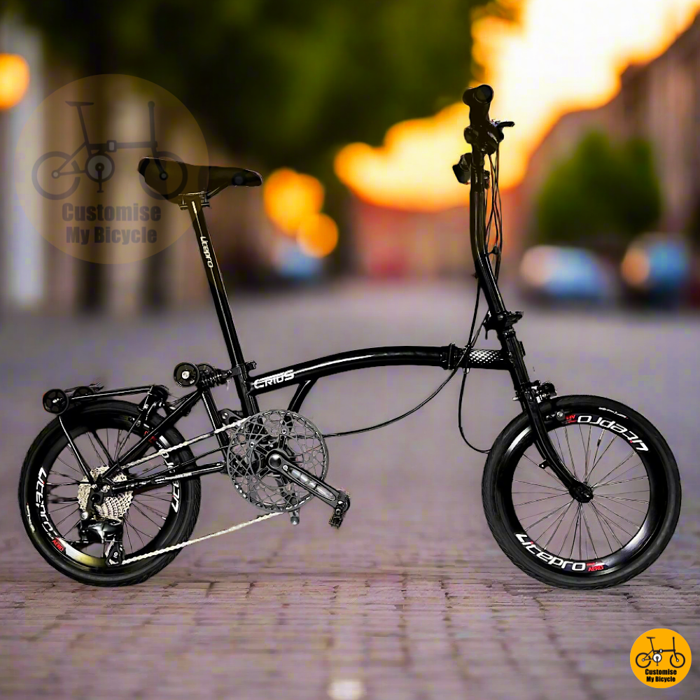 Crius Trifold 18-inch Piano Black Foldie with Shimano 10 Gears – Compact and Lightweight
