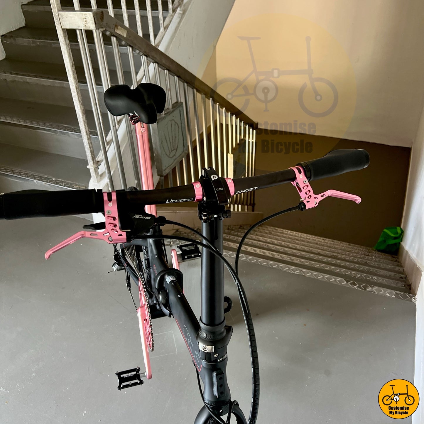 Folding bike for ladies with baby pink theme and Shimano gears
