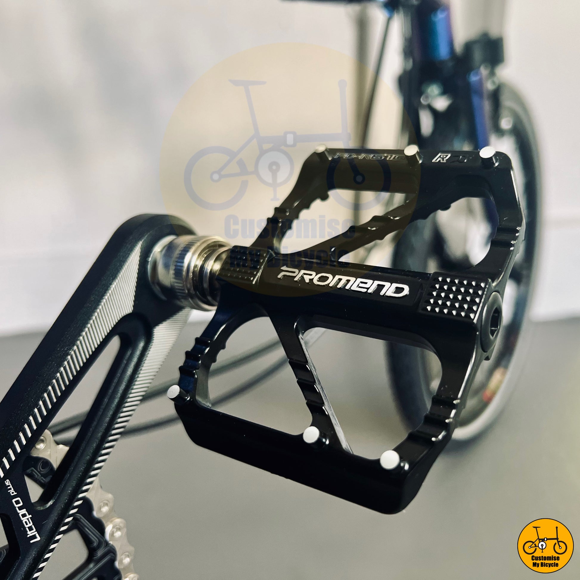 Promend R67 Pedals on Lightweight and compact trifold bike designed for bus and MRT commuting
