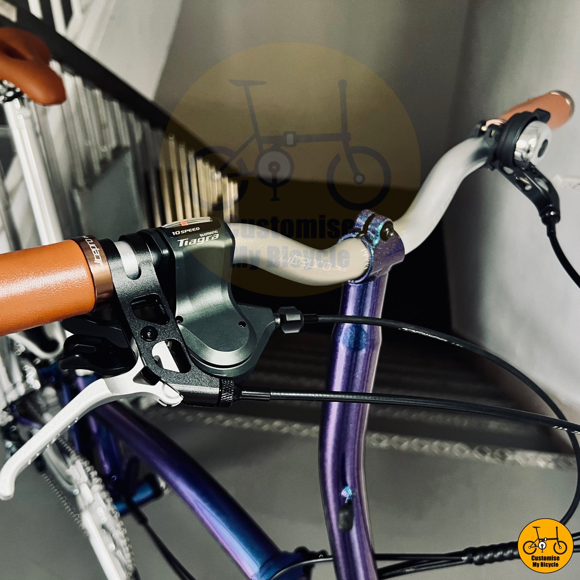 Glossy blue frame folding bike with ergonomic saddle and handlebars
