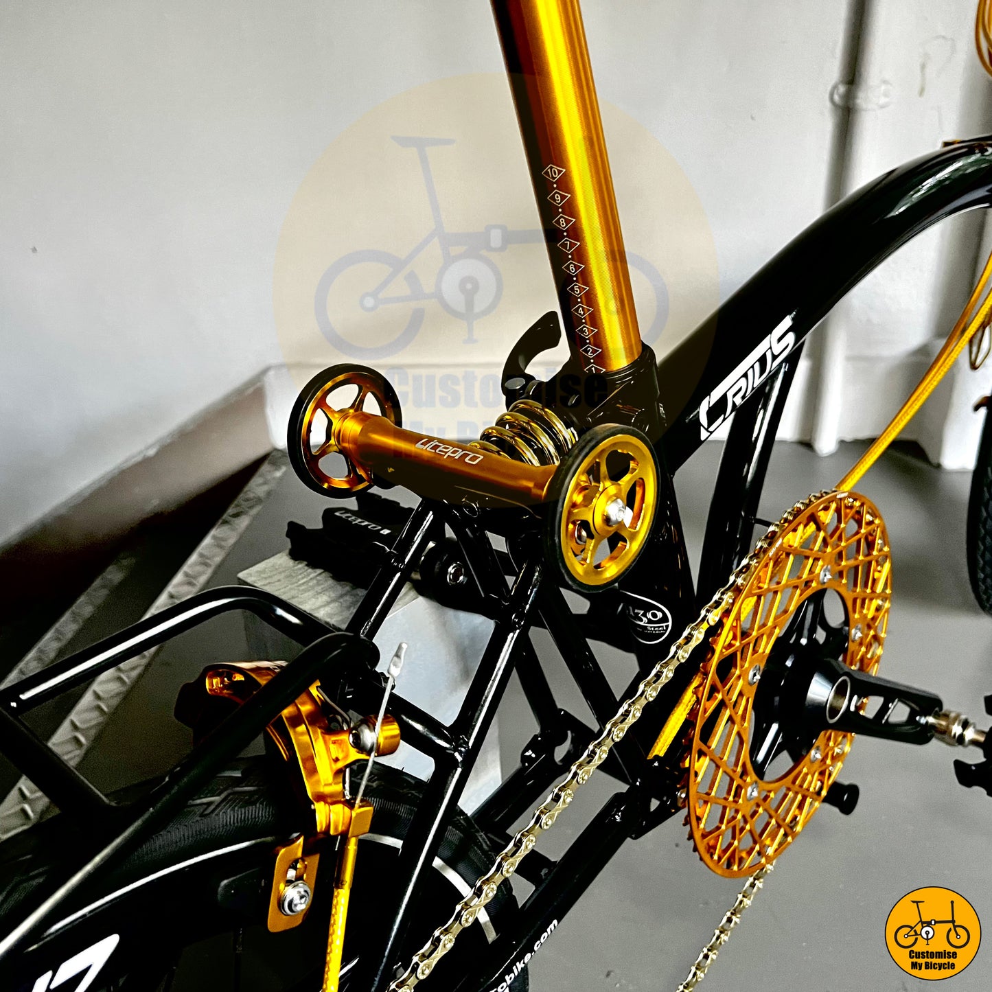 Extendable Ezy Wheels on Easy-carry folding bicycle with an elegant black finish
