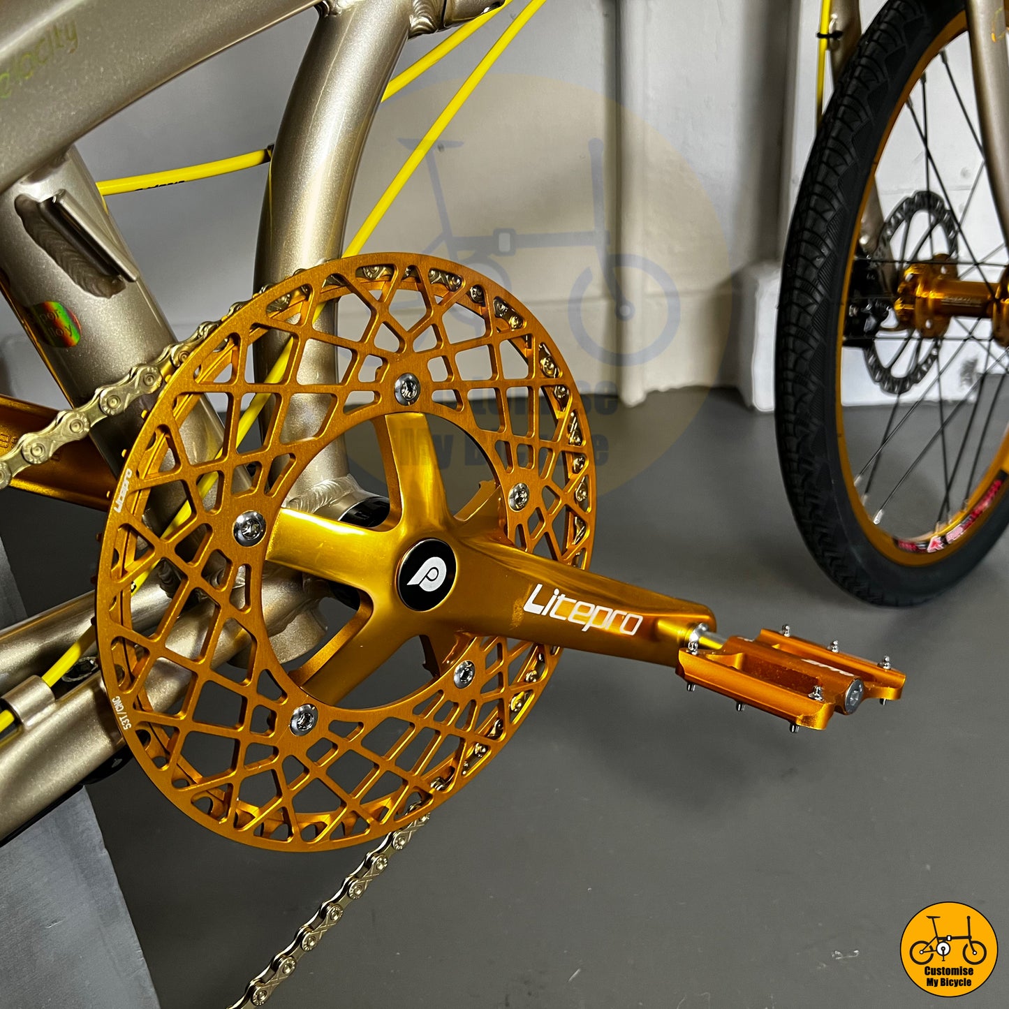 Custom gold Litepro components on Crius Velocity, highlighting the stylish design and performance parts