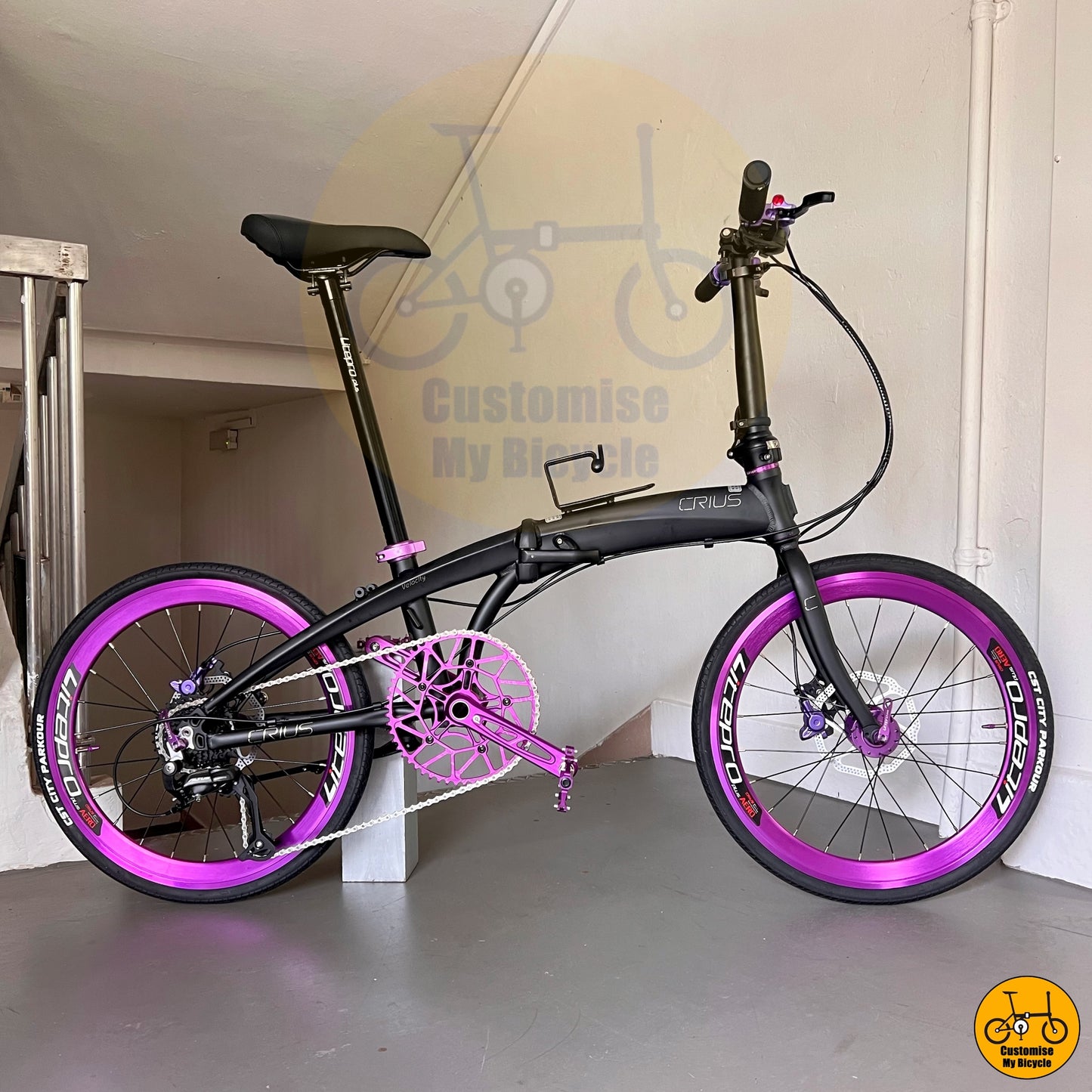 Crius Velocity 22-inch Folding Bike – Matte Black Frame with Royale Purple Wheels
