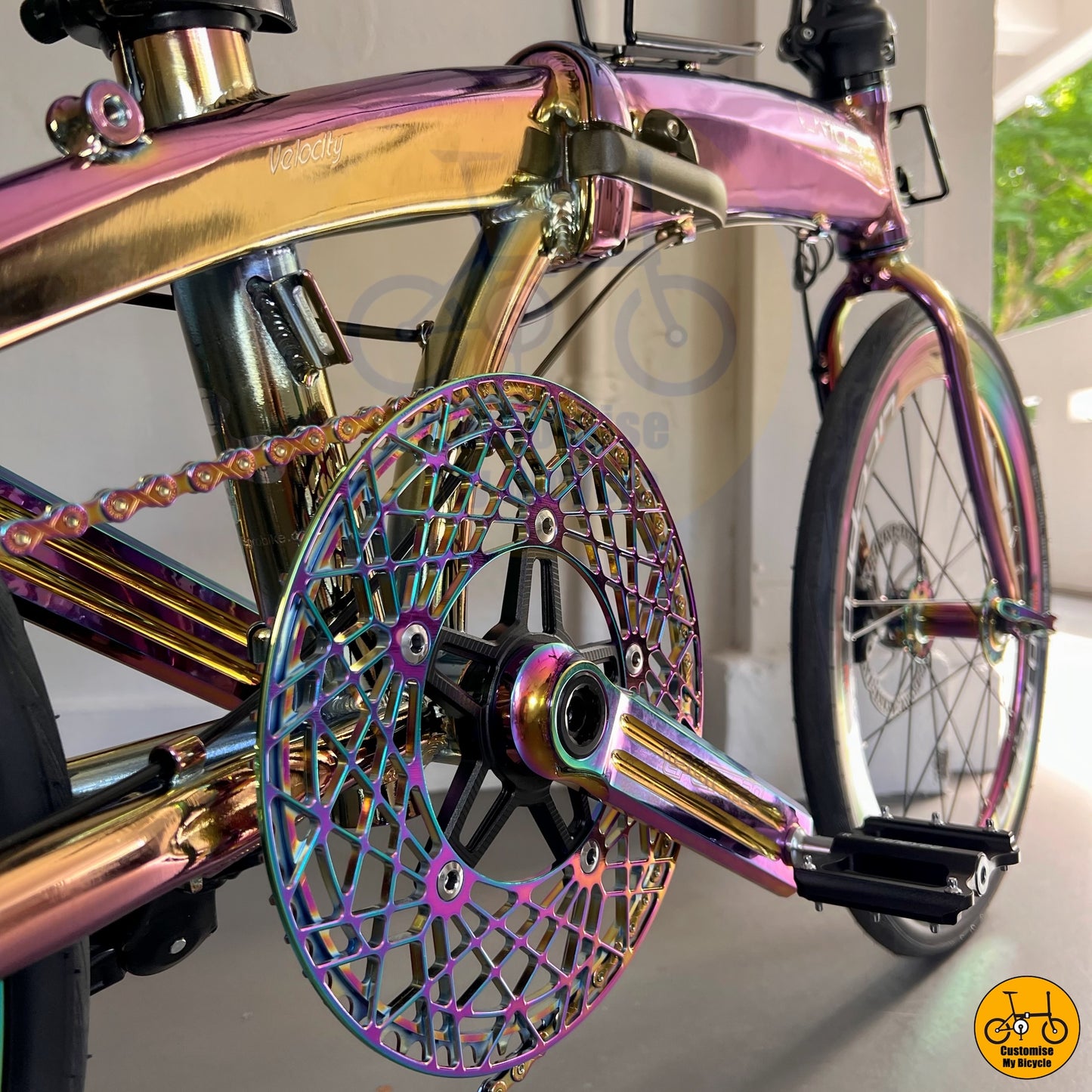Oil slick chainring with a stylish open-cut design
