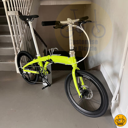 Stylish folding mechanism for effortless transport in MRT and buses
