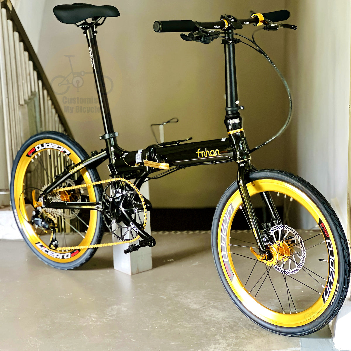 Fnhon Blast 22" Black Gold foldable bicycle with Shimano 9 gears