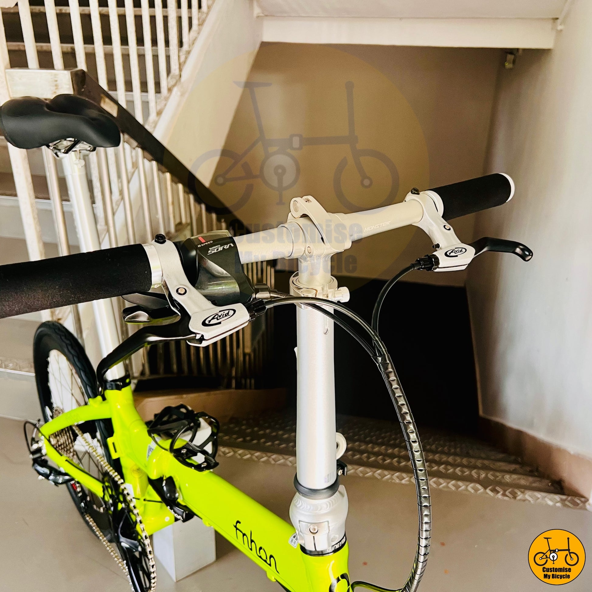 Silver brake lever on High-Performance Lime Green Fnhon Blast 22-Inch Folding Bicycle – Built for Speed
