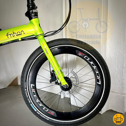 Close-up of Schwalbe Big Apple 2.0 wide tyres for extra cushioning
