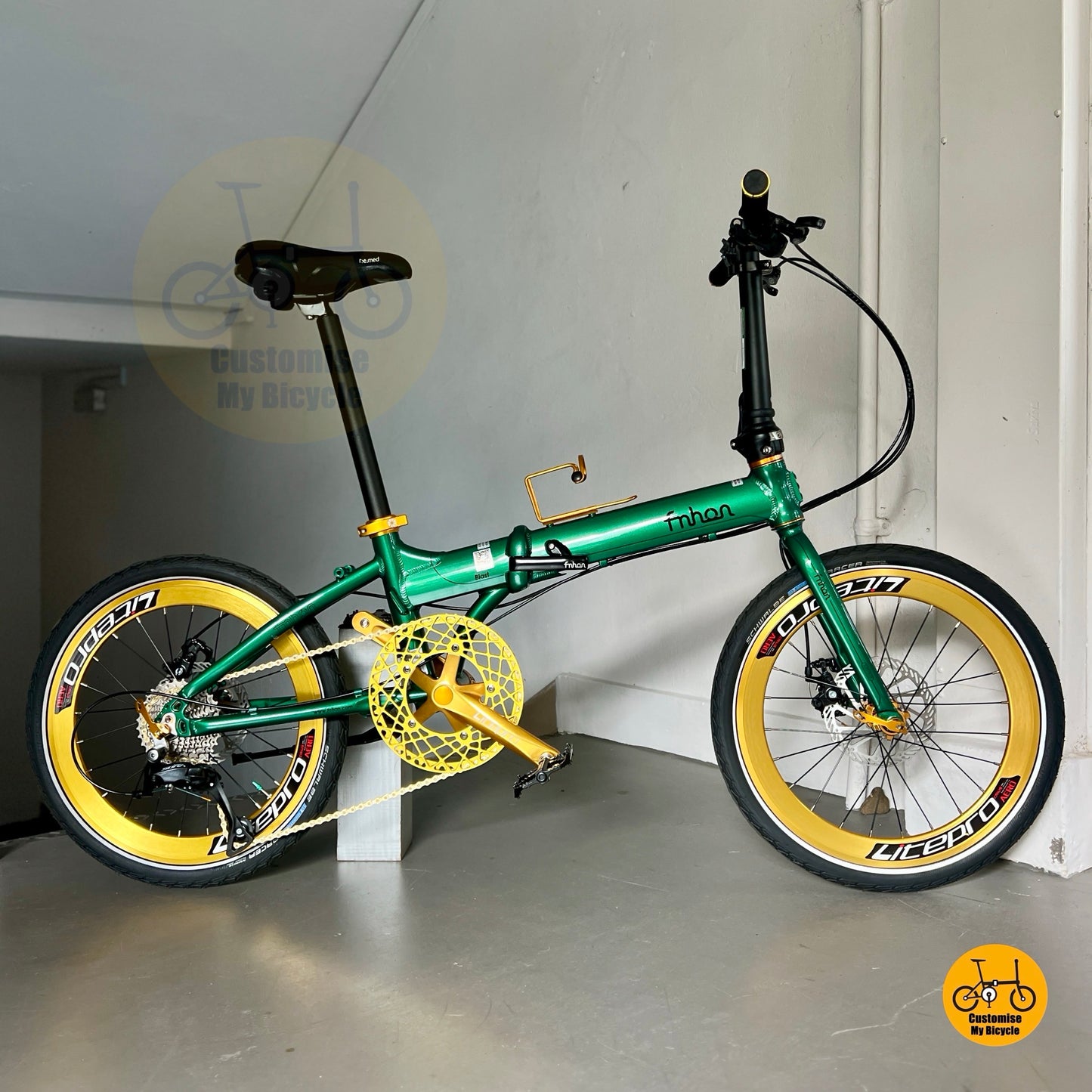 Fnhon Blast Shimano 9s Emerald Green foldable bicycle with gold accents and aero wheelset
