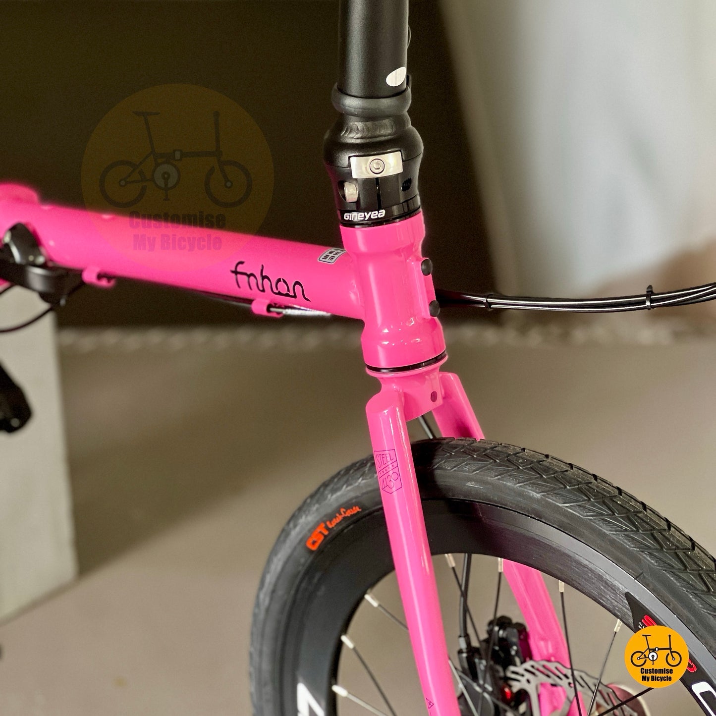 Fnhon Gust hot pink folding bike with hydraulic disc brakes and CST tyres
