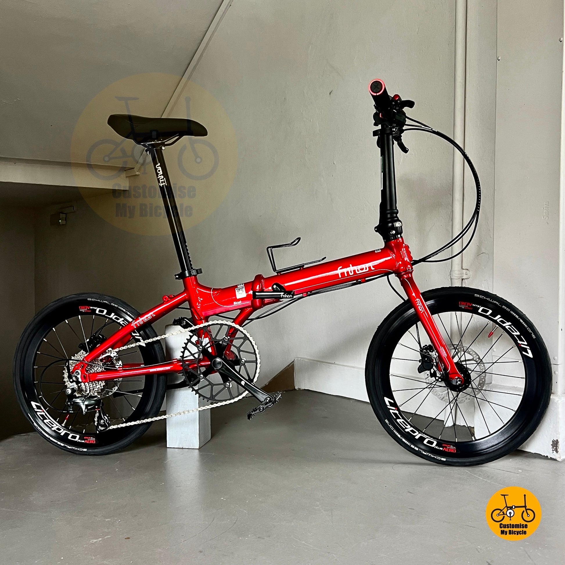 Red Fnhon Blast 20-inch folding bike side view  

