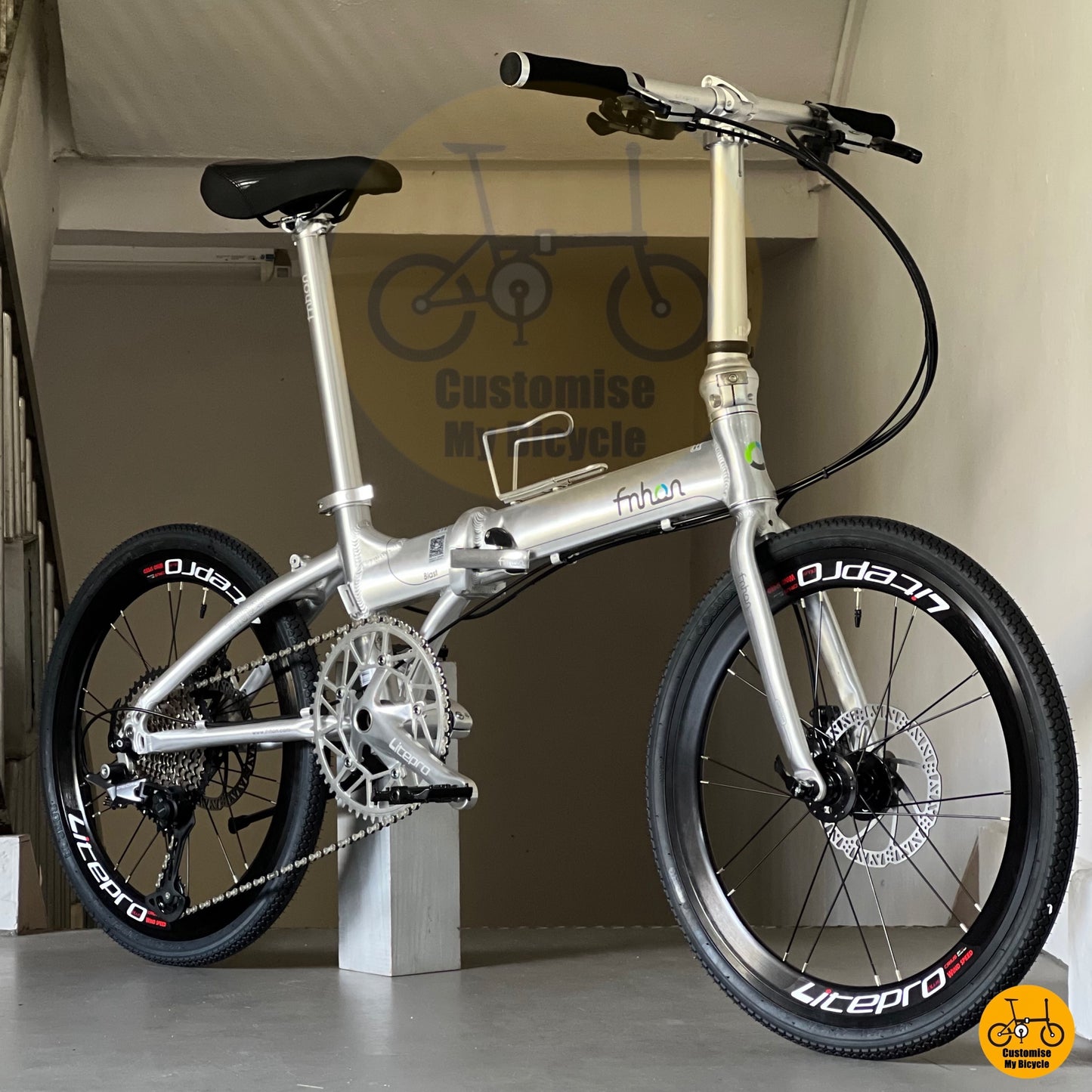 Fnhon Blast polished silver folding bicycle with Shimano 12-speed drivetrain  
