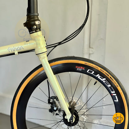 Lower front angle showcasing the Beige Fnhon Gale with Schwalbe One tyres and Litepro wheels

