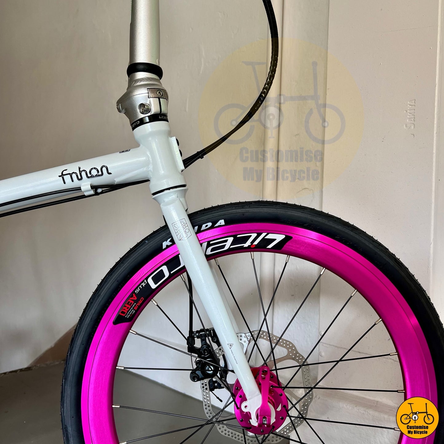 Litepro aero wheels in neon pink on Fnhon bicycle
