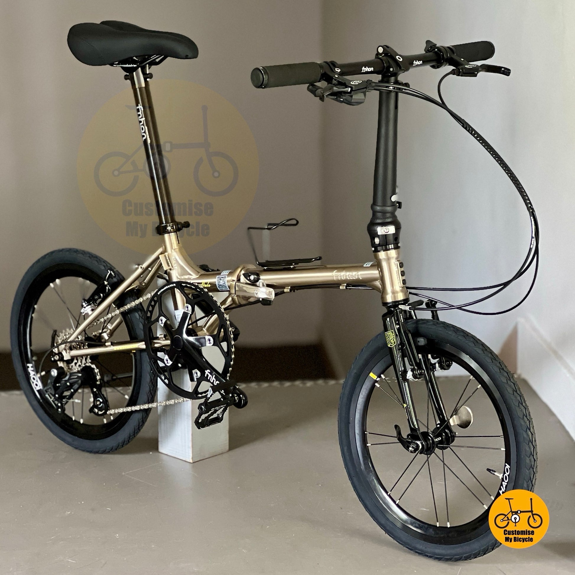 Basikal lipat Fnhon Gale 18-inci Titanium Gold dengan Sensah 5 kelajuan dan roda aero
