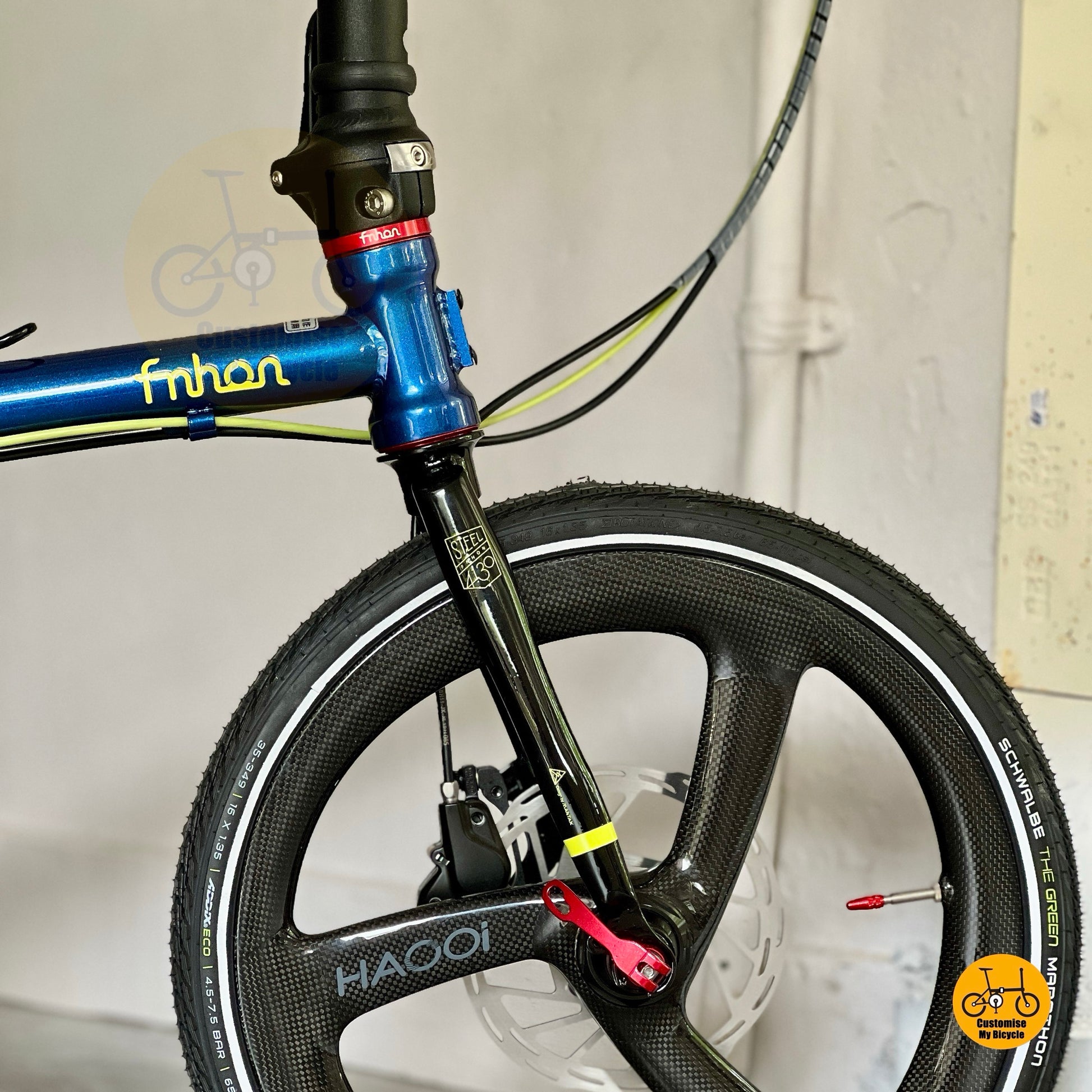 Fnhon Gust folding bike rear angle view with Schwalbe Marathon tyres compact folding bicycle
