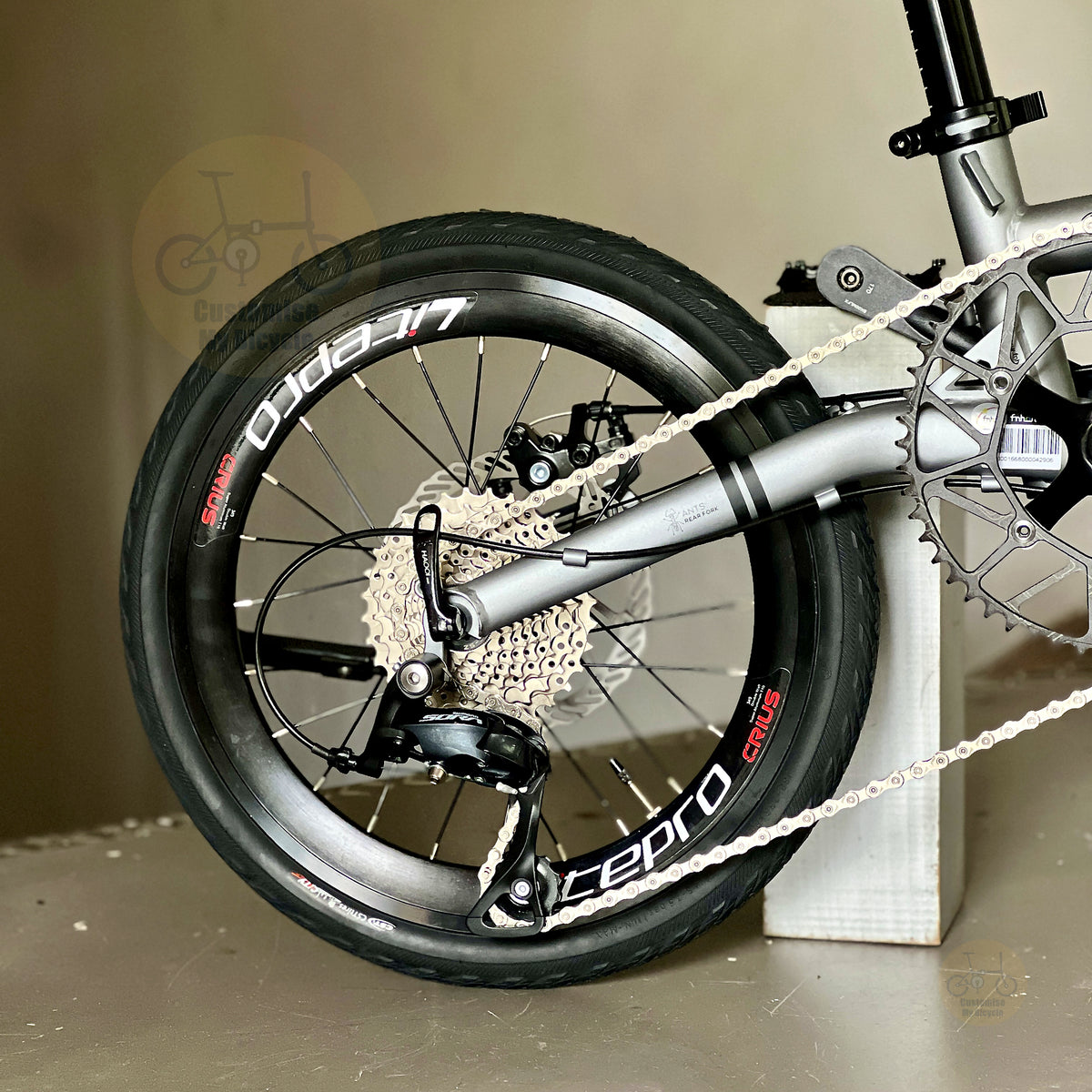 Fnhon Gust 16" Battleship Grey folding bike in compact folded configuration