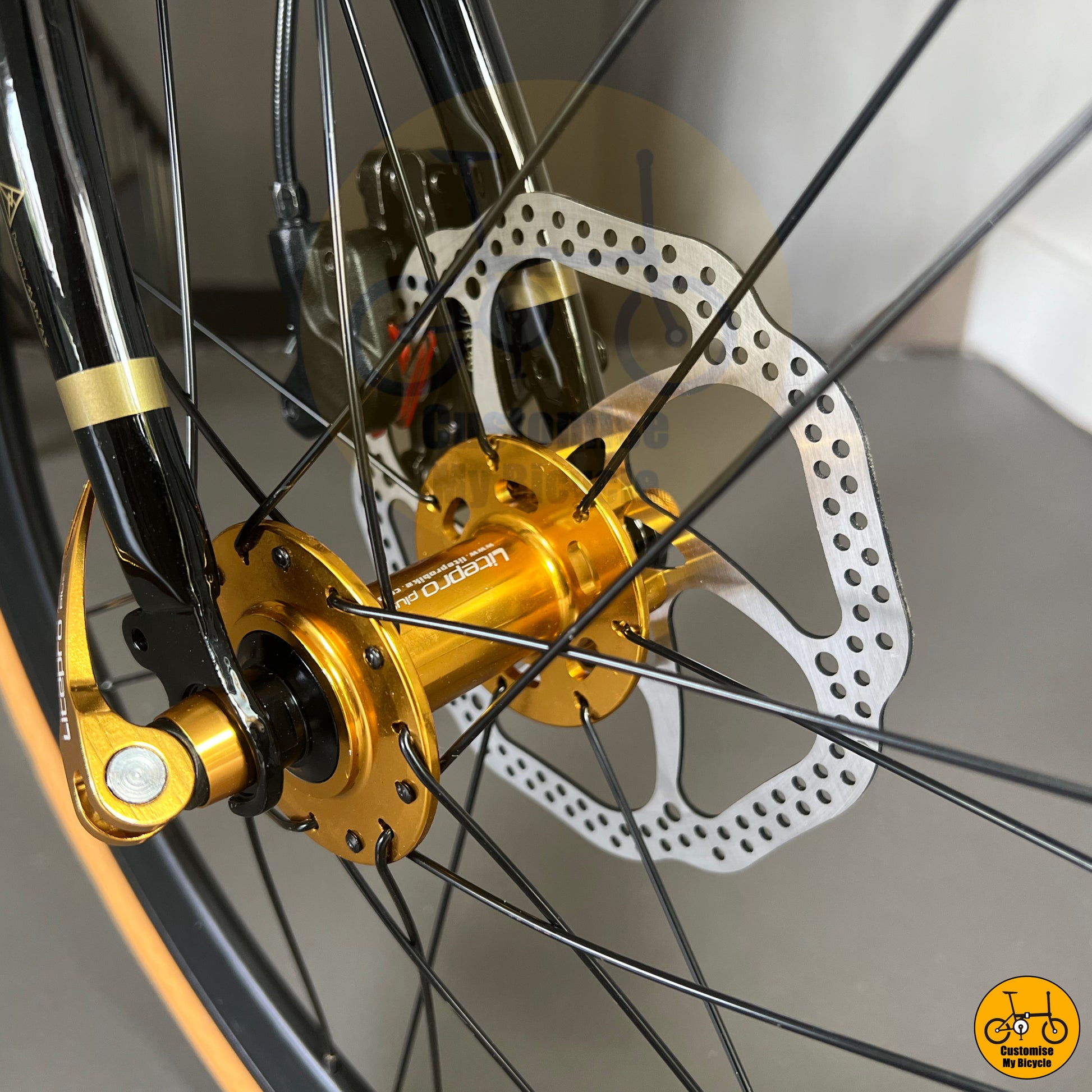 Deep sea blue folding bike with premium disc brakes for safety
