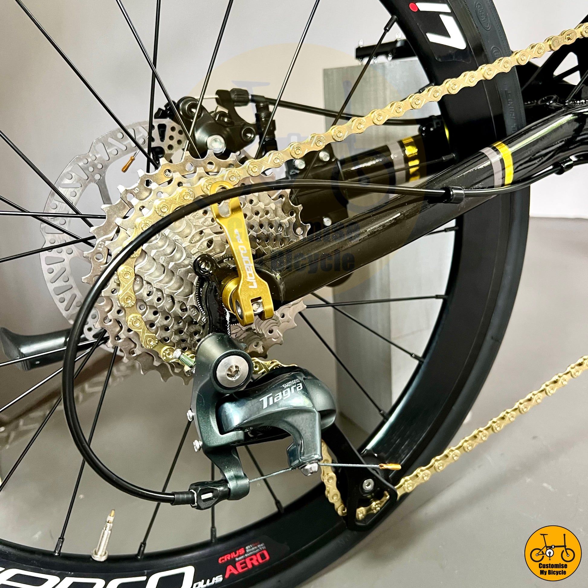 Black and gold folding bike with smooth Shimano 10 gears Tiagra shifting system
