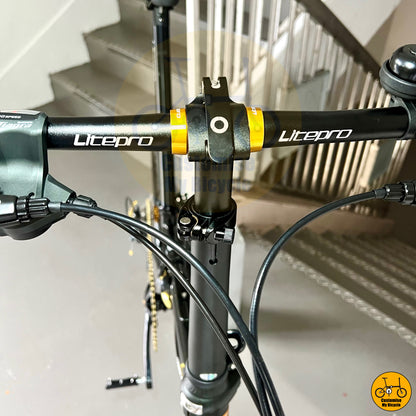 Stylish city commuting bike with black gold frame and ergonomic handlebars
