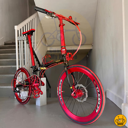 Fnhon Gust 22-Inci – Basikal Lipat Rangka Hitam Emas dengan Aksen Merah Berani
