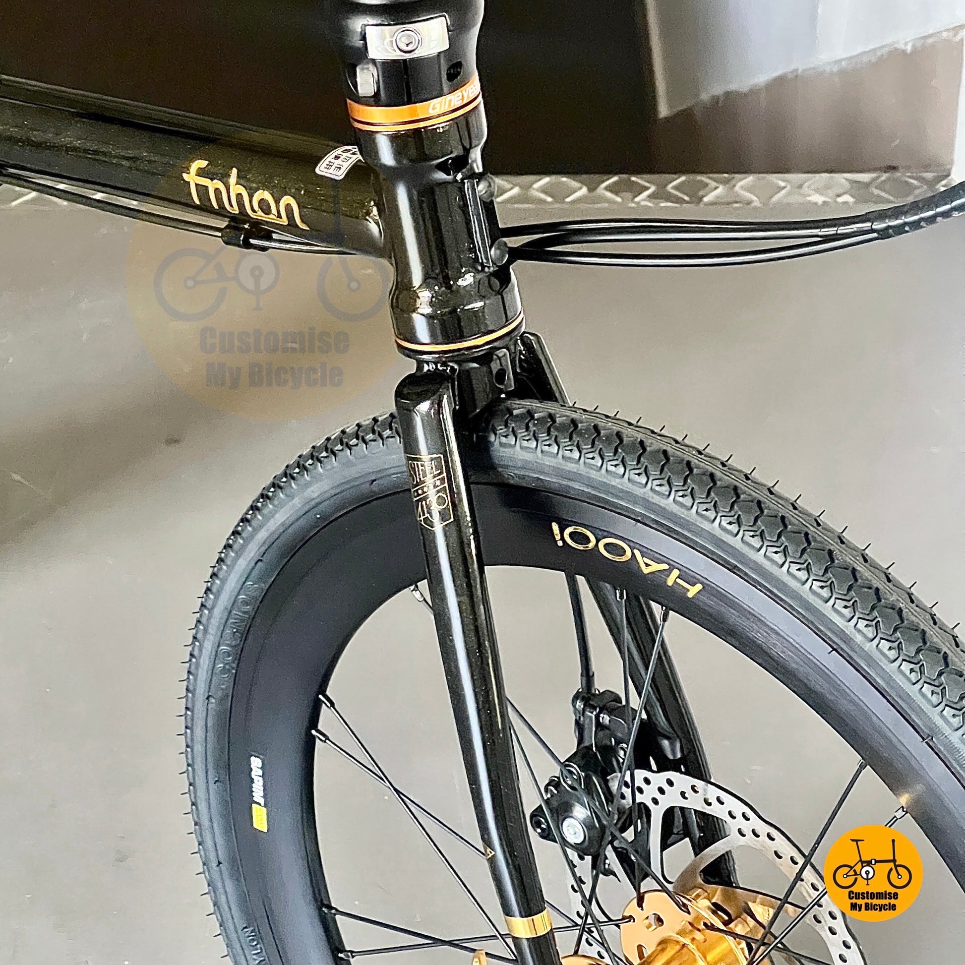 Chromoly frame foldie in black gold colour
