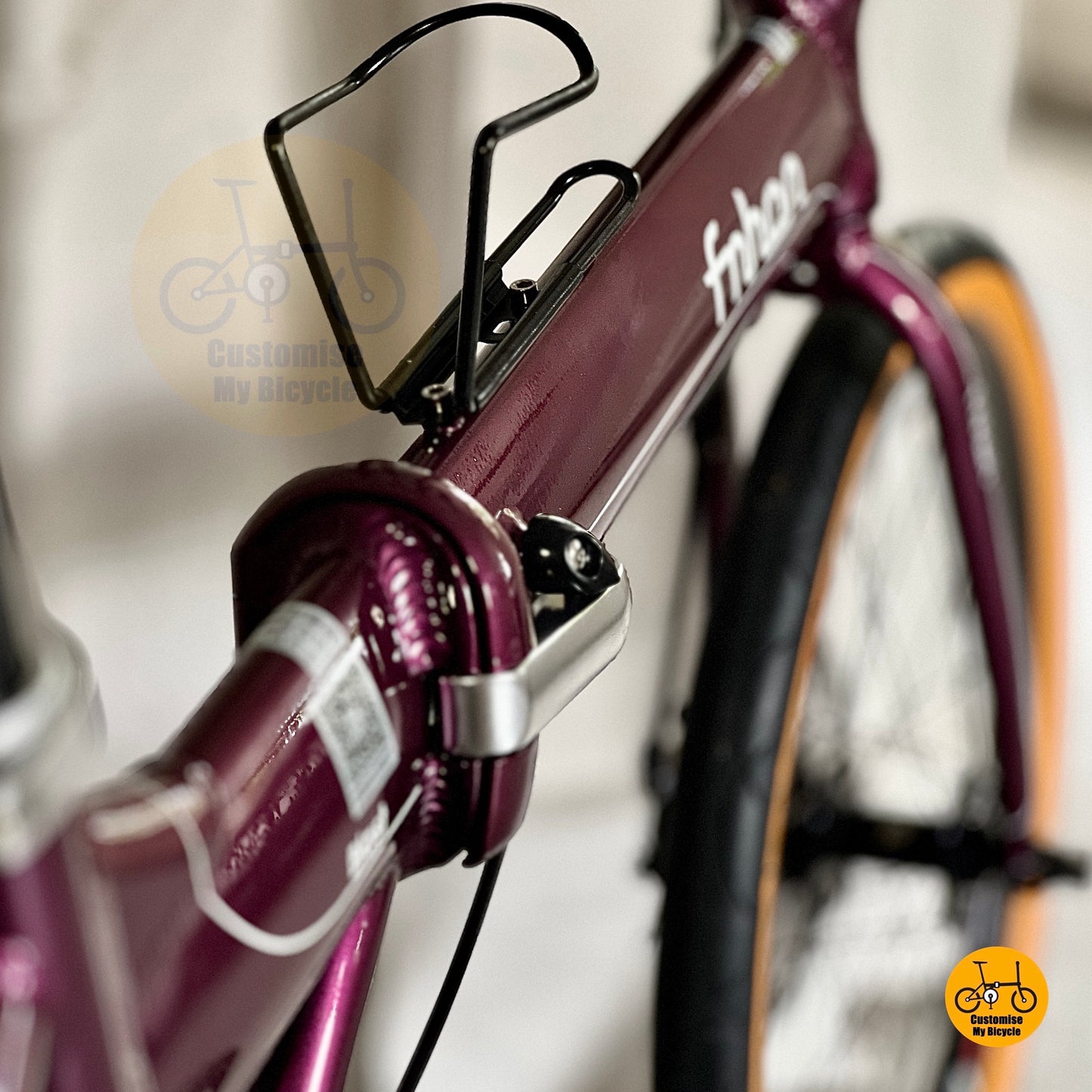 Detail shot of Fnhon Blast Royale Purple folding bicycle showing comfy saddle and adjustable seatpost