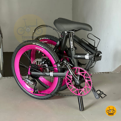 Fnhon Gust 20-inch matte black foldie with hot pink Litepro wheels side view
