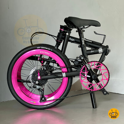Folded Fnhon Gust matte black bike with pink rims side view for product listing