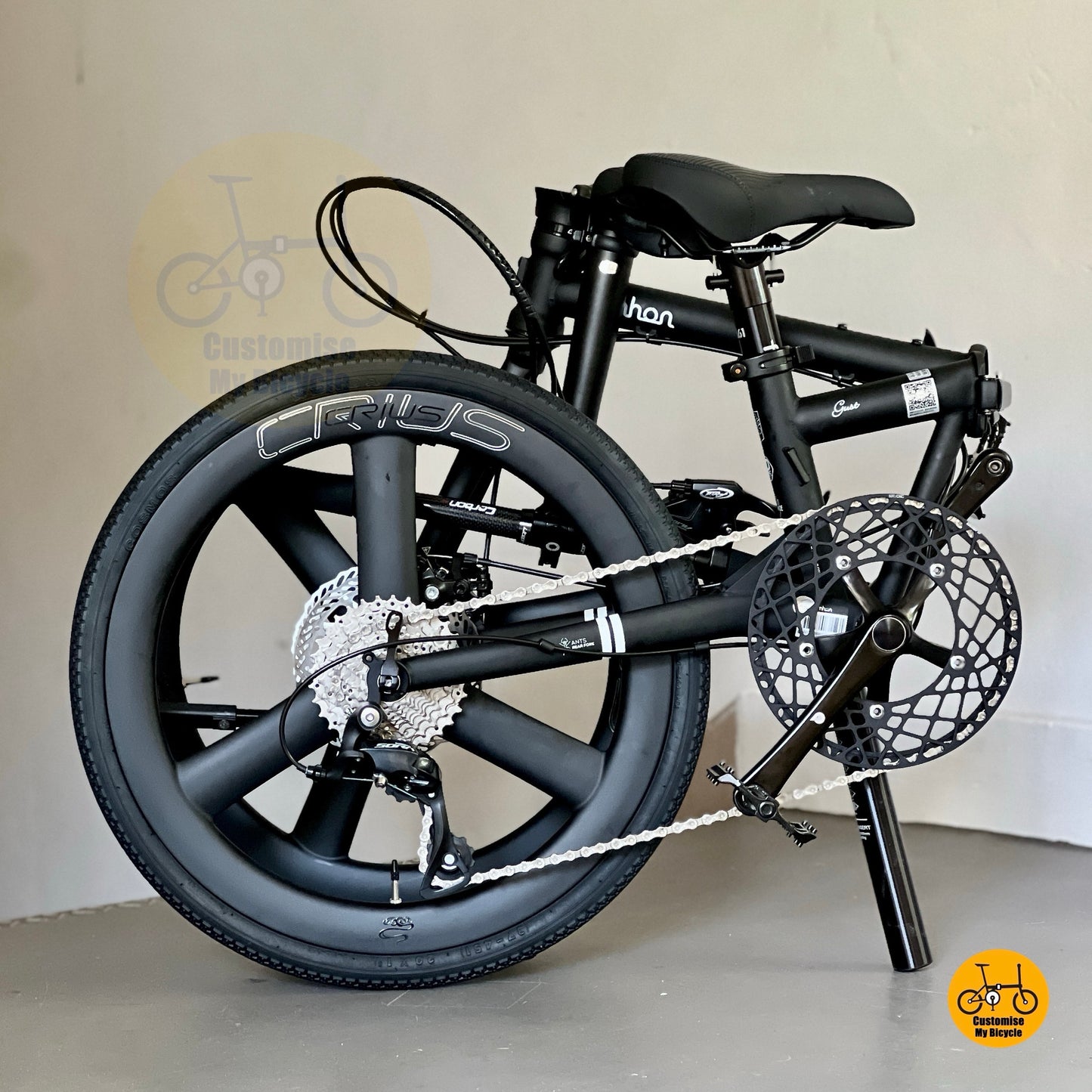 Full folded version of Fnhon Gust Matte Black 22 inch performance folding bike with Shimano 9 gears and Crius trispoke carbon wheels
