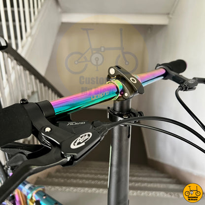 Ergonomic folding bike with a sturdy oil slick frame for smooth rides
