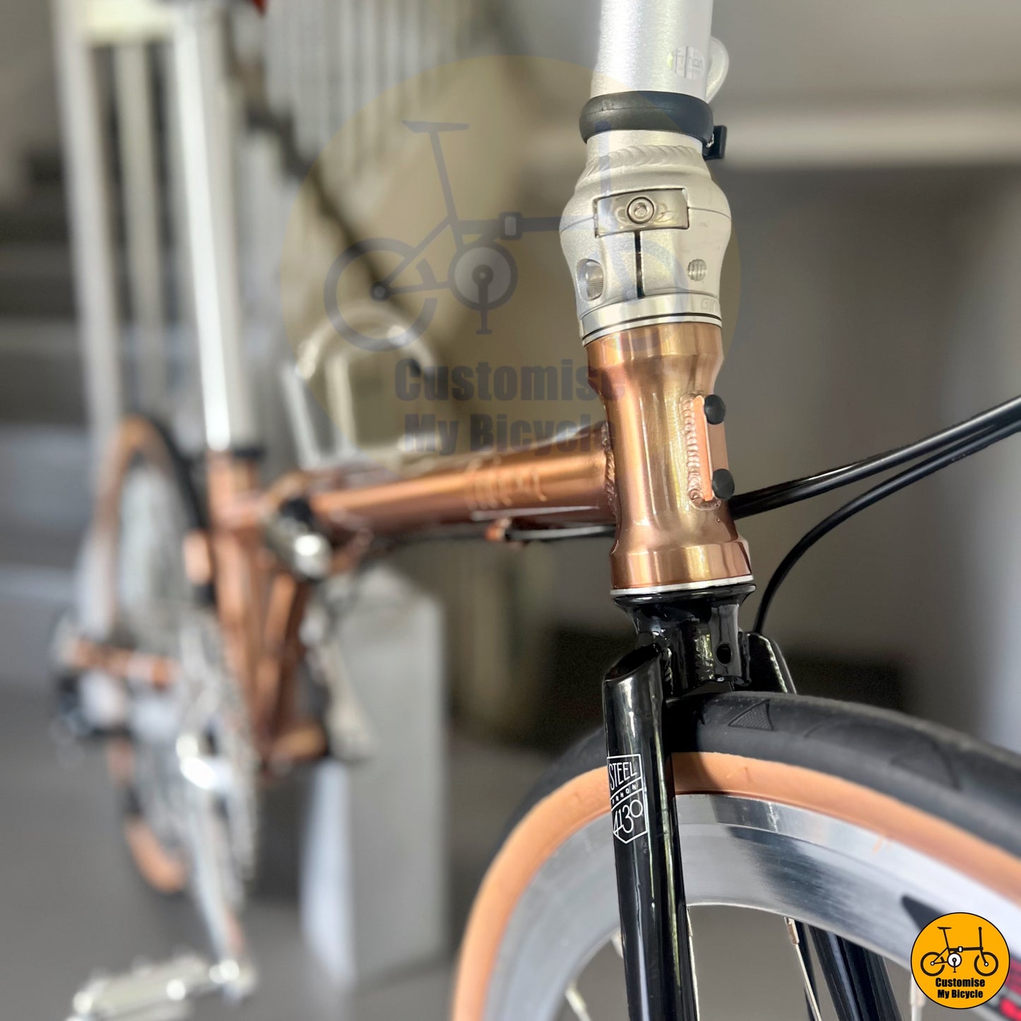 Strong rose gold frame folding bike with a stylish city look
