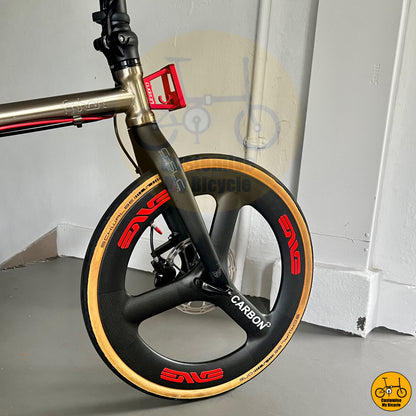 Titanium gold Fnhon Gust 20-inch folding bike with Carbonician Trispokes wheels
