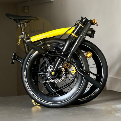 Fnhon GT20 Bumblebee 20 inch folding bicycle folded compactly showing the trifold design compact frame and easy transport configuration
