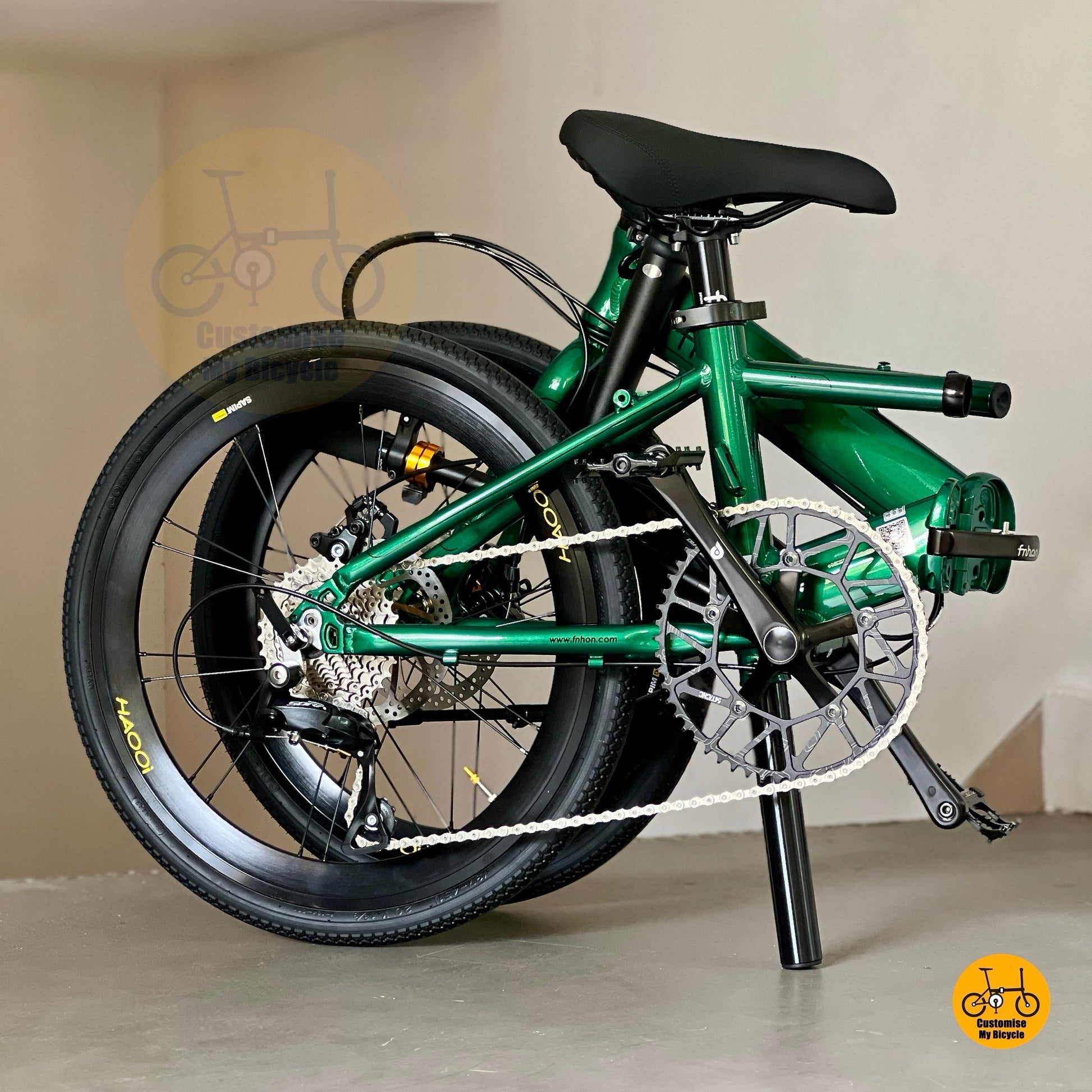 Detailed view of Fnhon adjustable handle post and seat post on Monsoon 22 inch folding bike