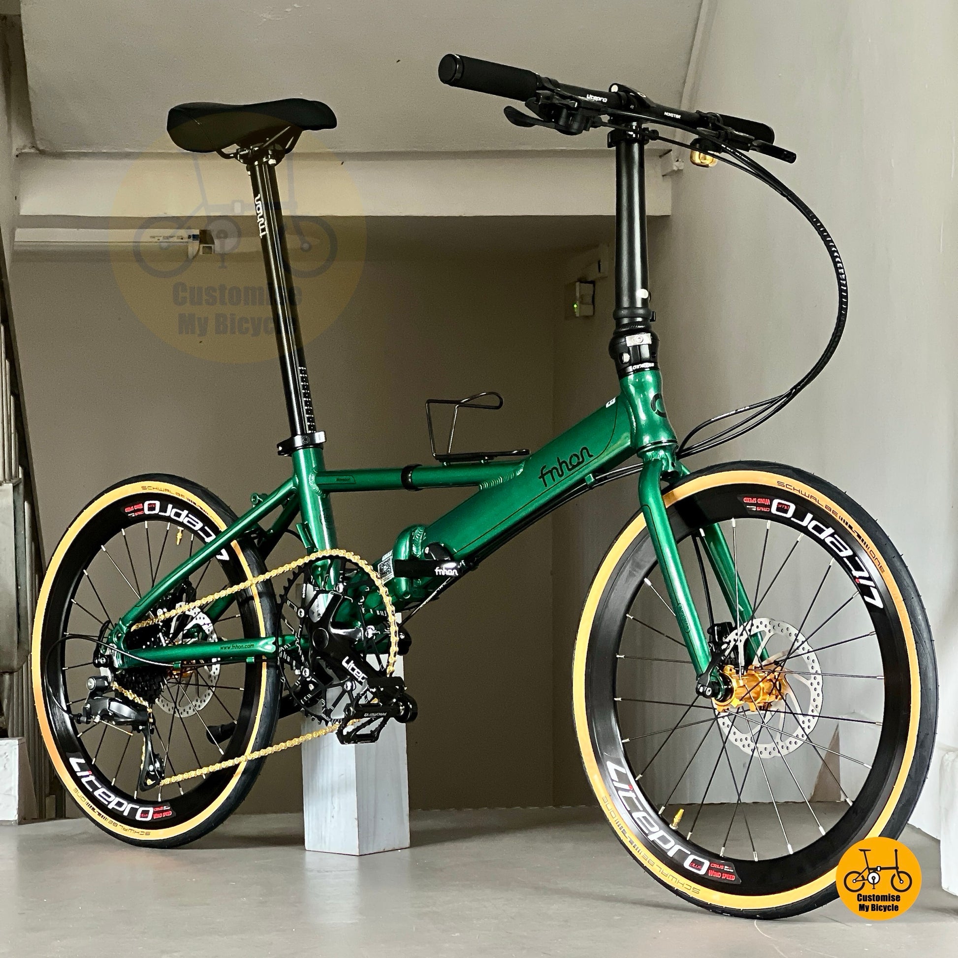 Basikal lipat Fnhon Monsoon 22 inci Shimano 9s Emerald Green ringan dan bergaya
