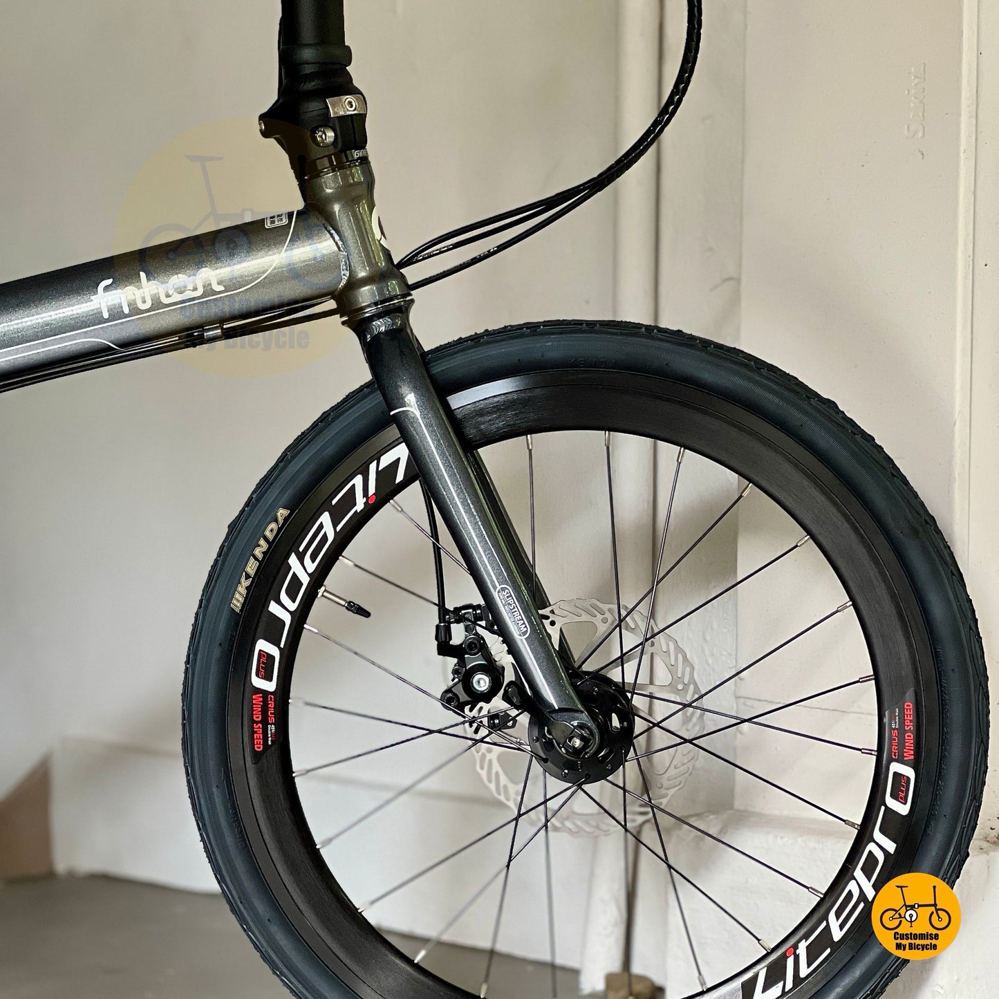 Front wheel close up showing Litepro Aero high profile rim and Kenda tyre  
