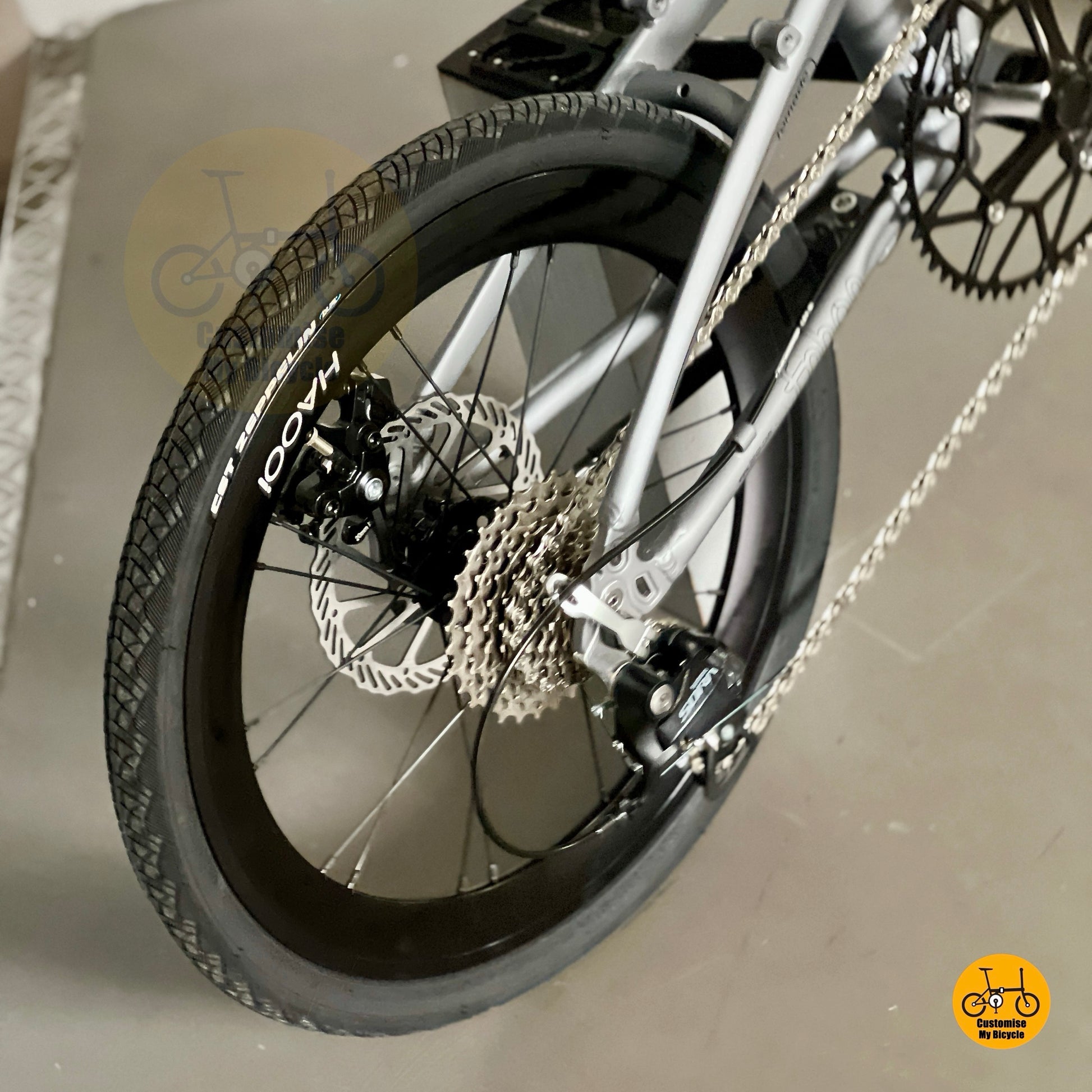 Close up of Shimano 9 gears Sora R3000 rear derailleur and shifting components
