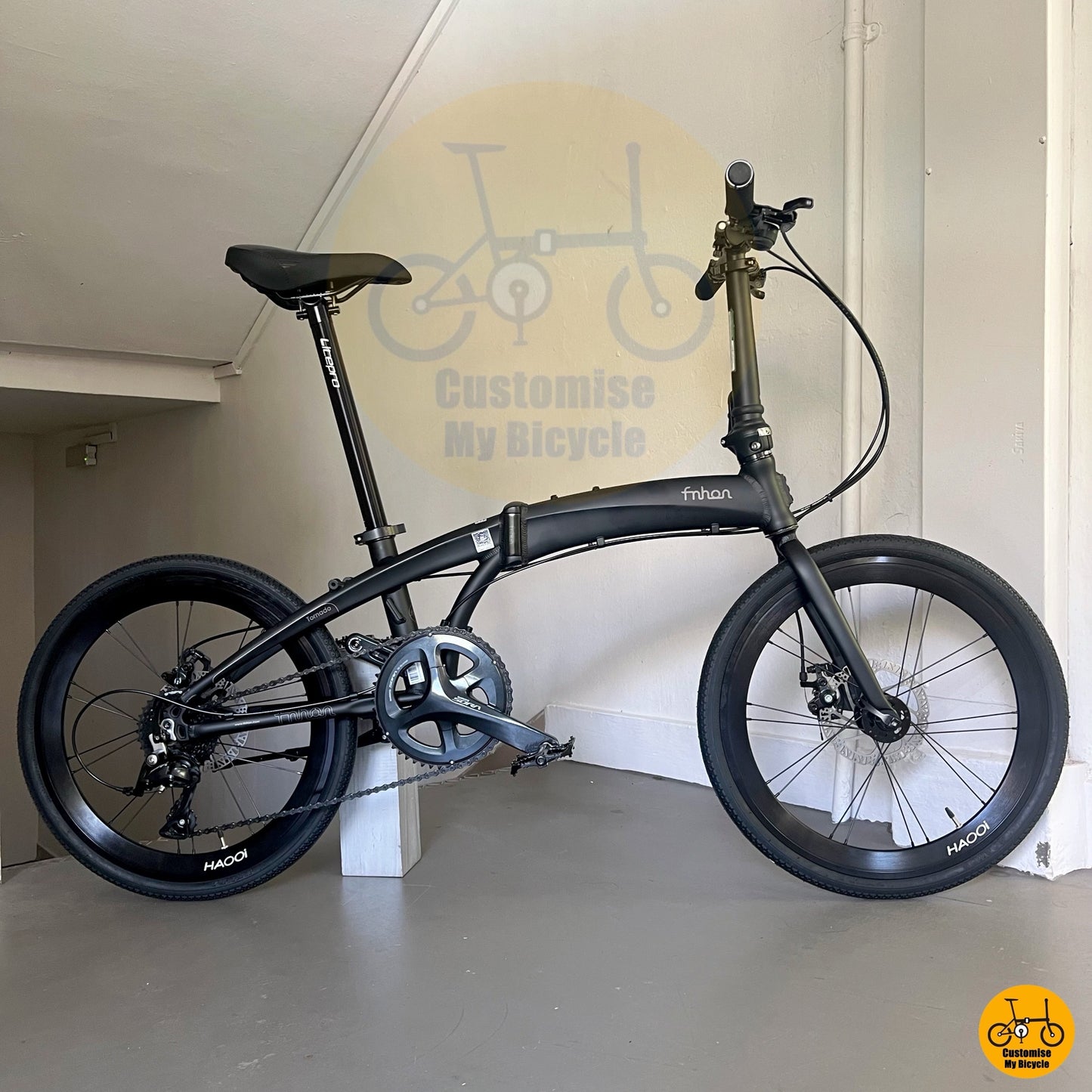 Fnhon Tornado 22 Basikal Lipat Rim Besar Shimano Sora dan Warna Hitam Batman
