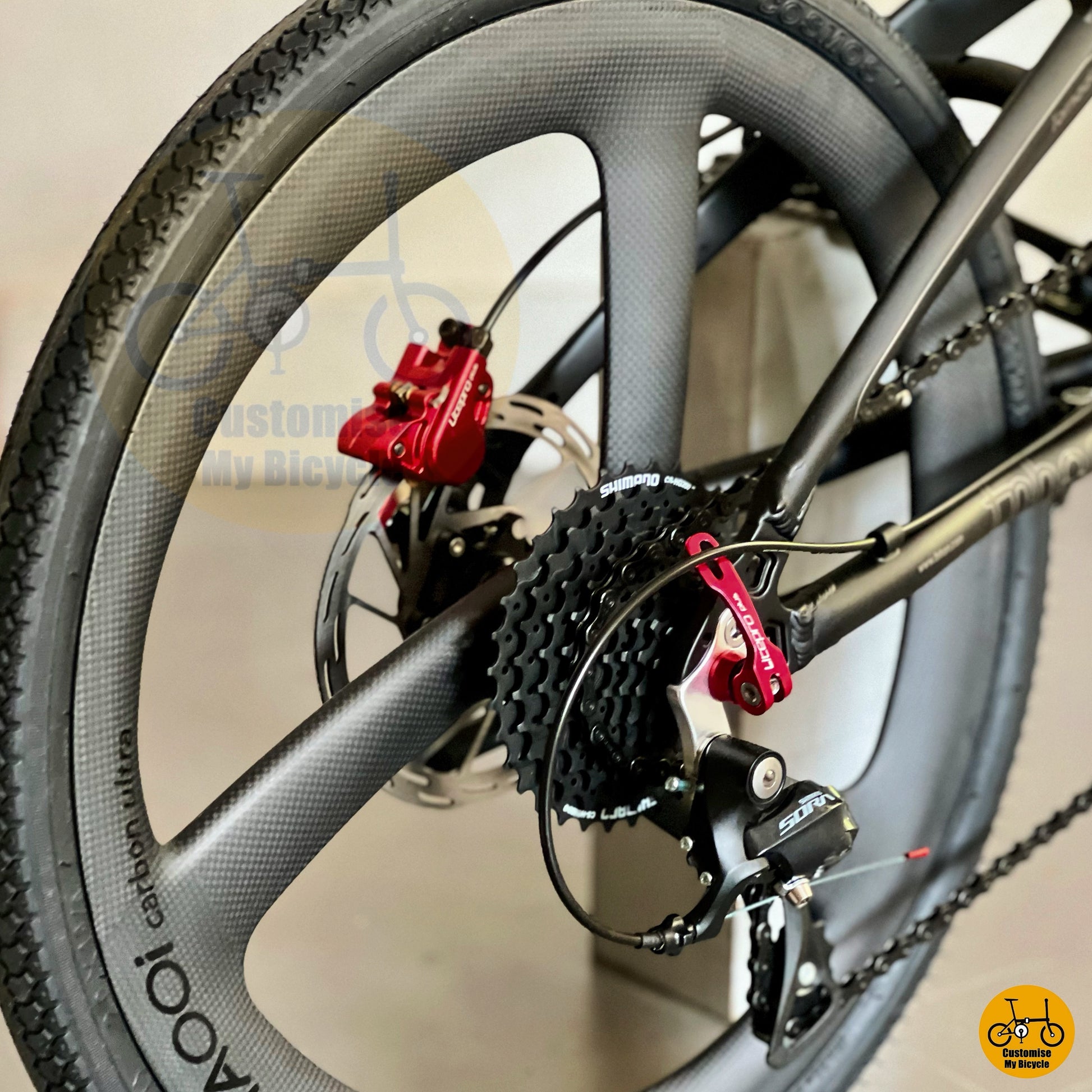 Matte black and red colour theme on city-ready foldable performance bike
