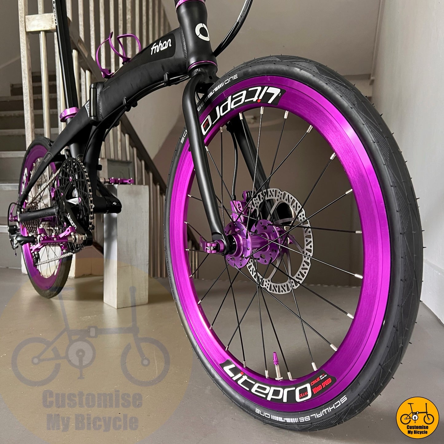 matte black city bike with dolphin-shaped frame
