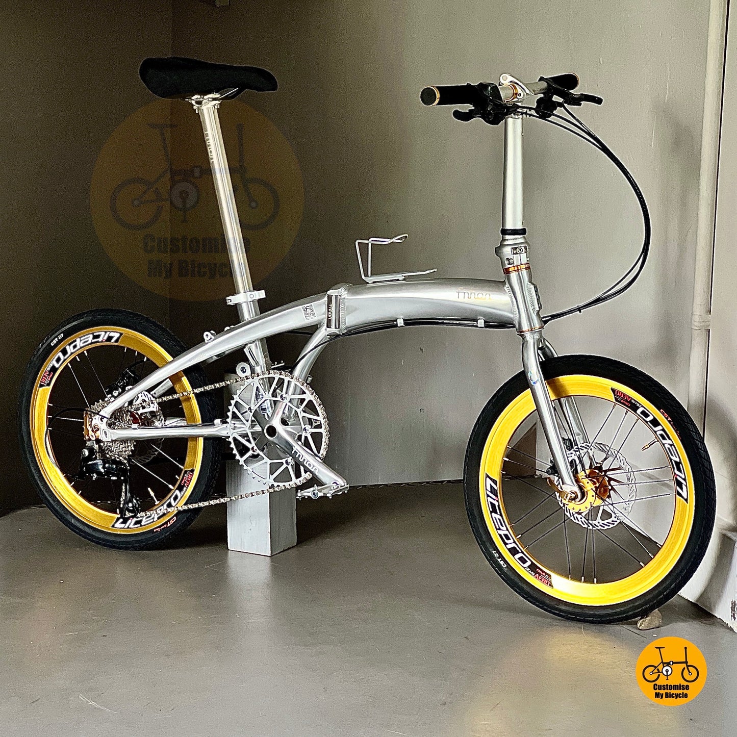 Comfy saddle and Gineyea pedals on Fnhon Tornado Polished Silver
