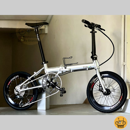 Fnhon Zephyr 16" Platinum Silver folding bike in compact folded configuration