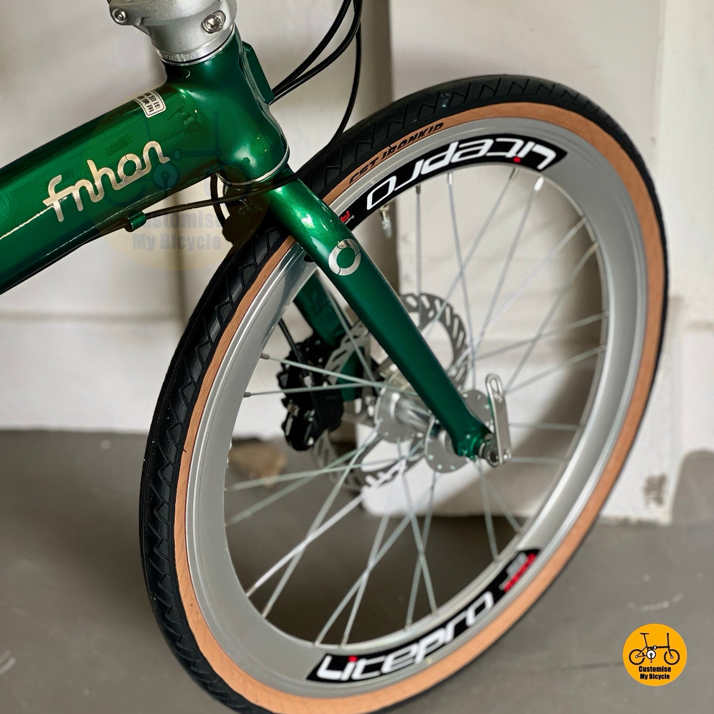 Top angle showing CST Ironkid tyres on Fnhon Wind folding bike  
