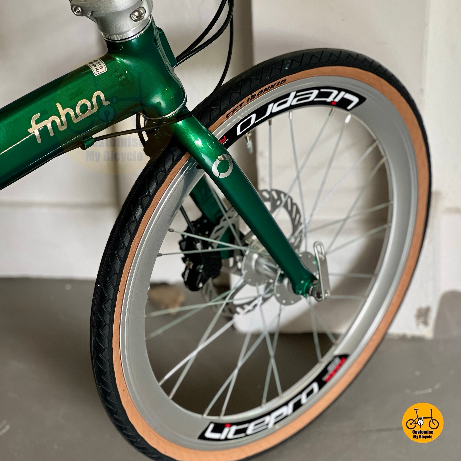 Top angle showing CST Ironkid tyres on Fnhon Wind folding bike  
