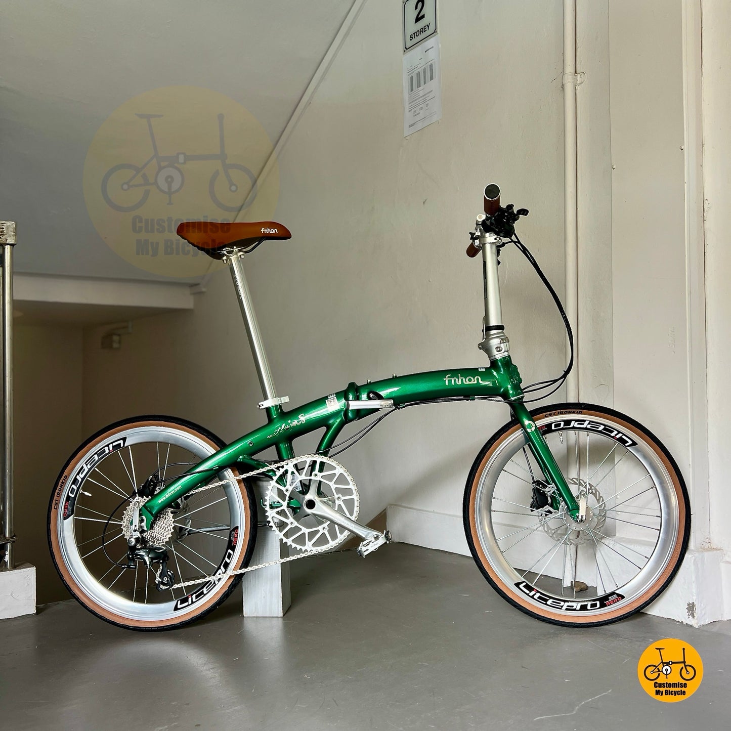 Detail of Litepro Hollowtech crankset and 54t chainring on Fnhon Wind folding bike  
