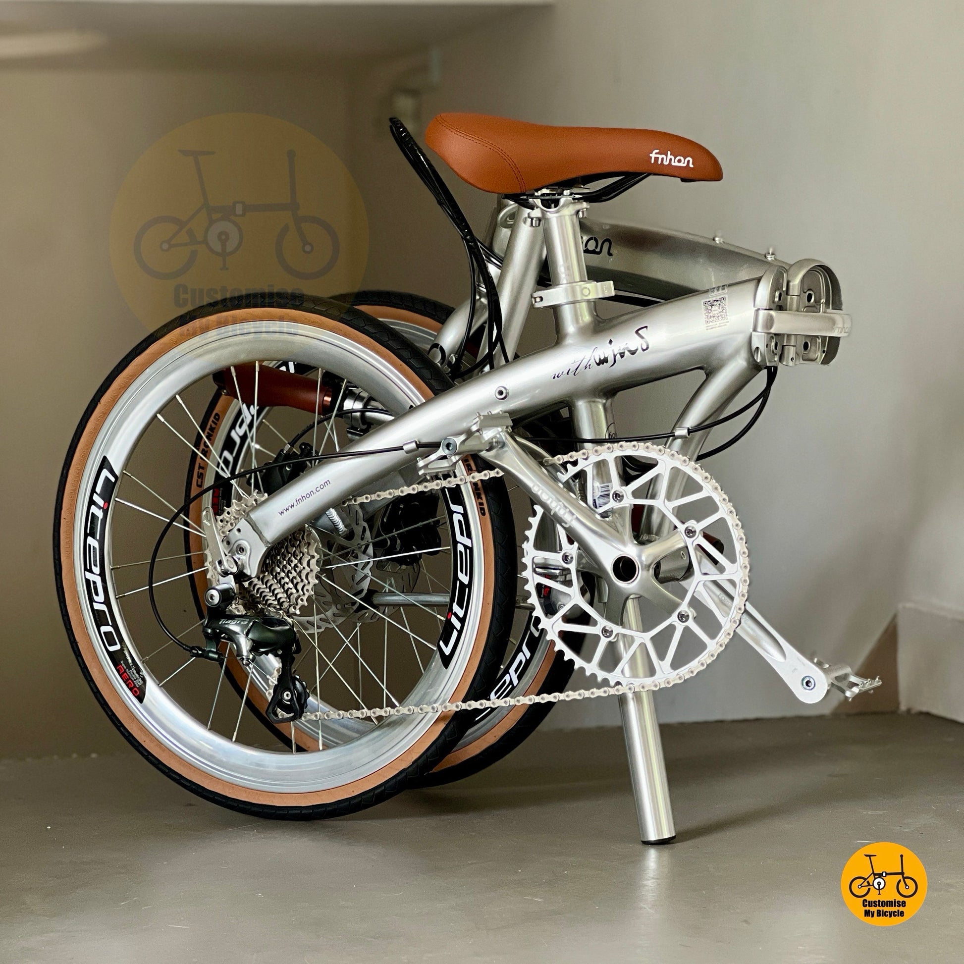 Folded size of Fnhon Wind 22 Inch Folding Bike Shimano 10 Speed Metallic Silver Litepro Wheels Hydraulic Brake
